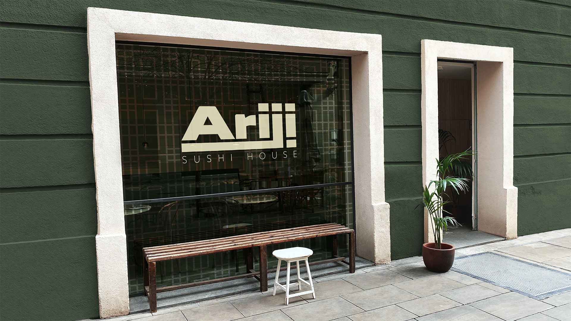 Sidewalk POV of ariji Storefront